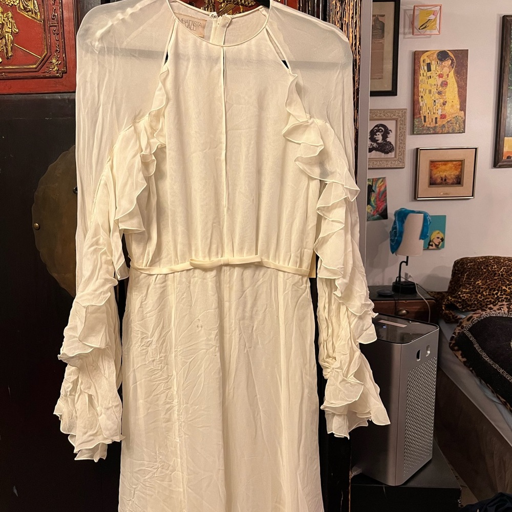 Giambattista Full length off white sheer ruffle-sleeved dress.